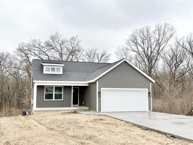 front view picture of 825 Morgan Drive, Belding, MI. 48809