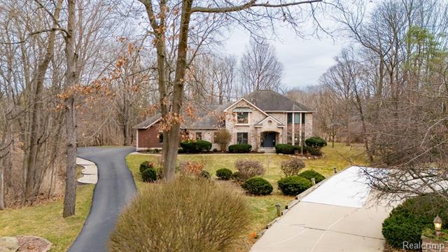 front view picture of 1835 Cimarron Drive, Okemos, MI. 48864