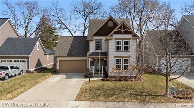 front view picture of 392 Stone Wood Ct, Milford, MI. 48381