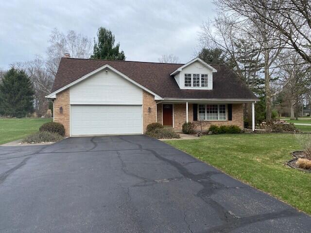 front view picture of 736 Stonegate Road, Ann Arbor, MI. 48103
