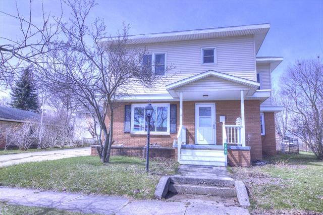 front view picture of 107 N Pine Street, Saint Louis, MI. 48880