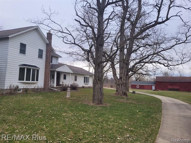 front view picture of 3067 N Mill Road, Dryden, MI. 48428