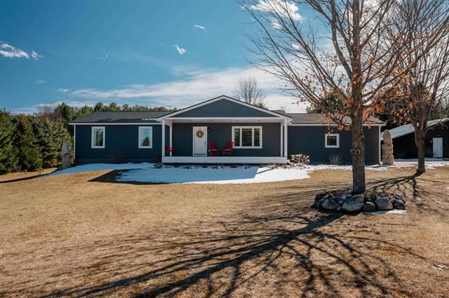 front view picture of 9812 Deal Road, Williamsburg, MI. 49690
