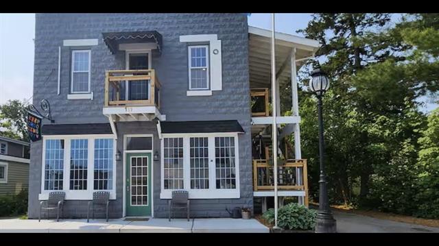 front view picture of 111 W Meinrad Street, Lake Leelanau, MI. 49653