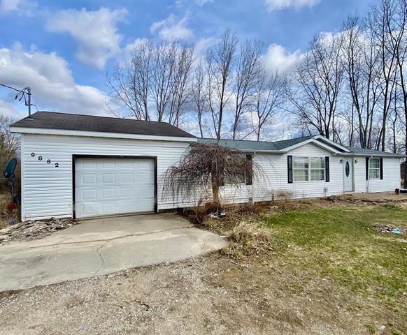 front view picture of 9882 W Drew Road, Weidman, MI. 48893