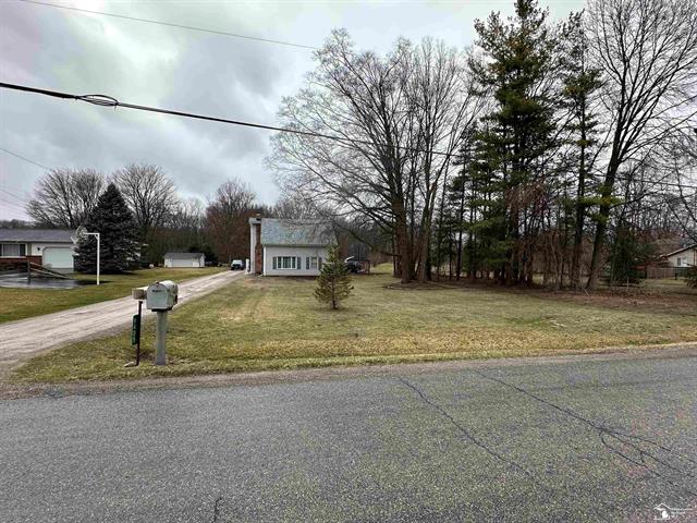 front view picture of 9405 Crabb Road, Temperance, MI. 48182