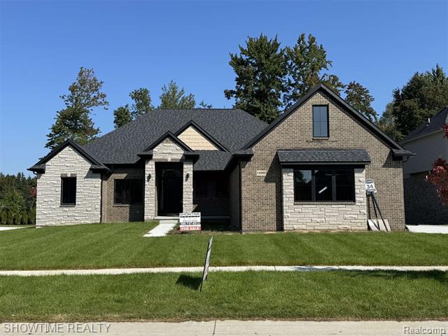 front view picture of 11695 Encore Drive, Utica, MI. 48315