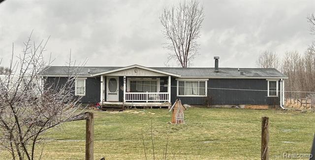 front view picture of 575 W Burnside Road, Fostoria, MI. 48435