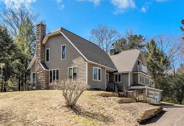 front view picture of 6051 Butternut Drive, West Olive, MI. 49460