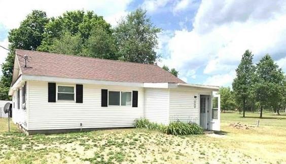 front view picture of 668 Se Sigma Road, Kalkaska, MI. 49646