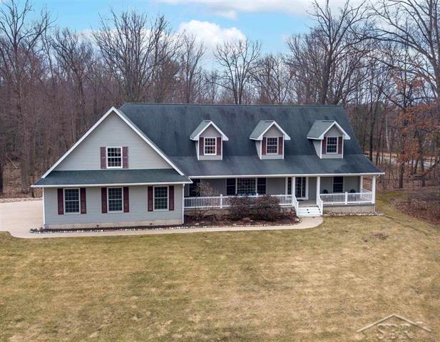 front view picture of 1477 W Nielsen Road, Sanford, MI. 48657