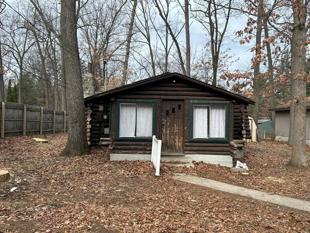front view picture of 203 Tudor Drive, Prudenville, MI. 48651