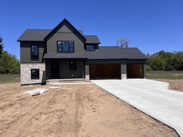 front view picture of 1297 Secluded Pines Drive Ne, Sparta, MI. 49345