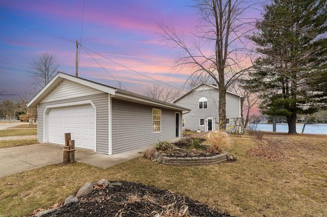 front view picture of 11428 S Shore Drive, Lake, MI. 48632