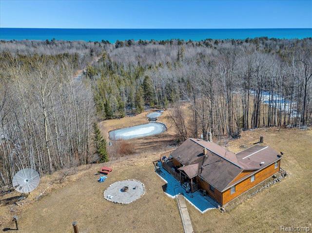 front view picture of 5300 E Alcona Road, Harrisville, MI. 48740