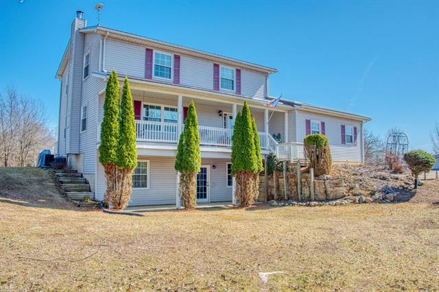 front view picture of 649 Busha Road, Owosso, MI. 48867