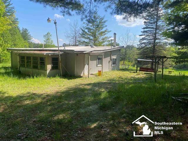 front view picture of 546 N M-30 Road, Gladwin, MI. 48624