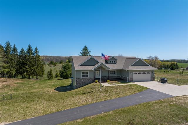 front view picture of 8233 Barney Road, Traverse City, MI. 49684