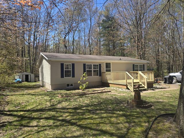 front view picture of 6819 Linden Road, Ludington, MI. 49431