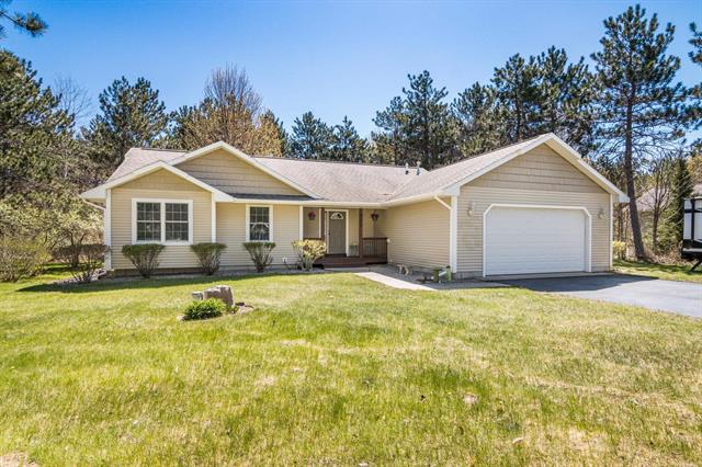 front view picture of 8256 Mapleleaf Drive, Traverse City, MI. 49684