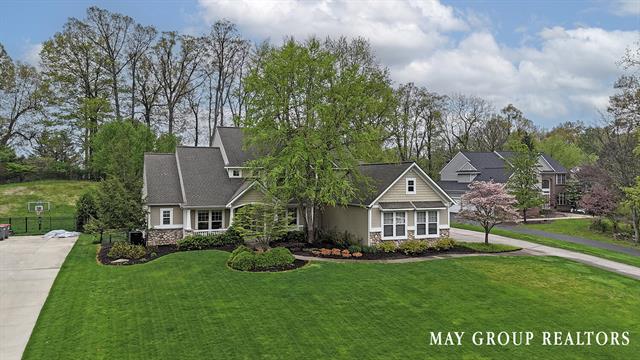 front view picture of 7828 Autumn Woods Drive Se, Ada, MI. 49301