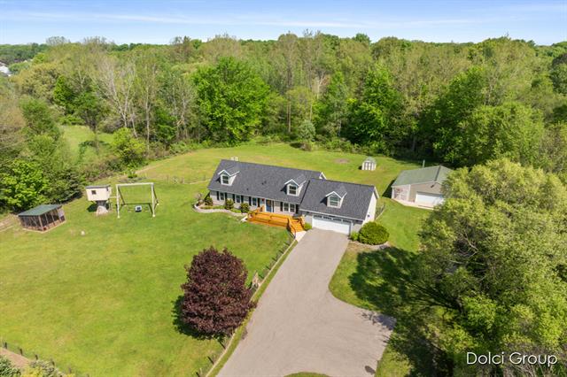 front view picture of 1003 10 Mile Road Nw, Sparta, MI. 49345