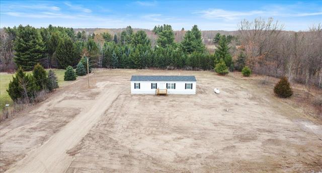 front view picture of 20389 Freedom Drive, Pierson, MI. 49339