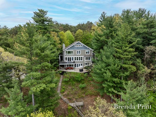 front view picture of 2100 Timber Point Drive Se, Ada, MI. 49301