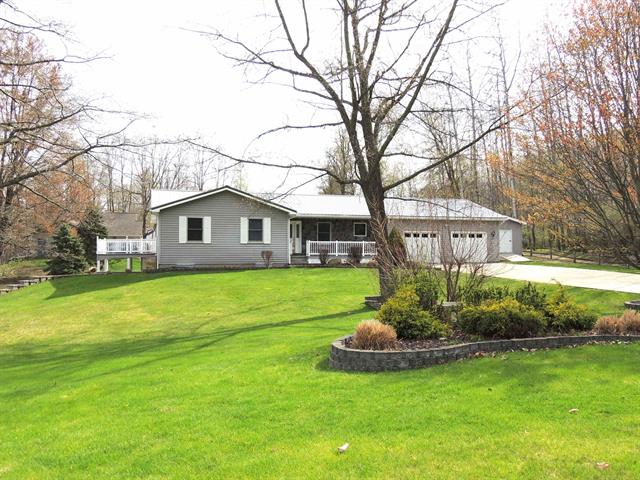 front view picture of 1026 Granada Drive, Weidman, MI. 48893