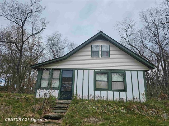 front view picture of 4562 Trail Road, Caseville, MI. 48725