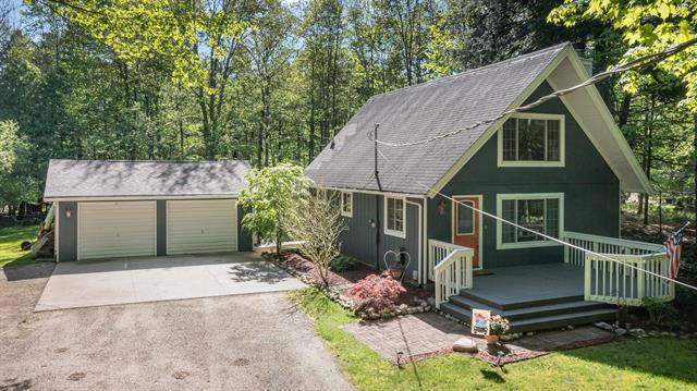 front view picture of 4550 Blue Cedar Drive, Mount Pleasant, MI. 48858