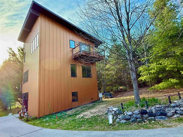 front view picture of 10959 E Pobuda Road, Suttons Bay, MI. 49682