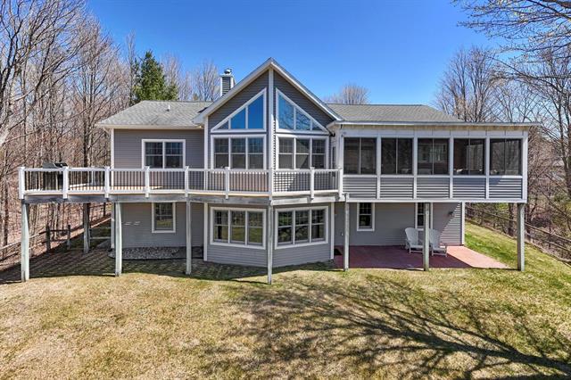 front view picture of 2455 E Meander Lane, Cedar, MI. 49621