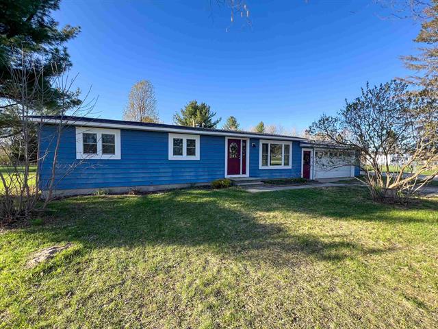 front view picture of 586 Holiday Drive, Bellaire, MI. 49615