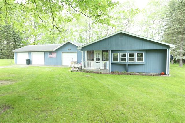 front view picture of 1078 Duquesa Drive, Weidman, MI. 48893