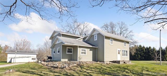 front view picture of 8023 Bray Road, Vassar, MI. 48768