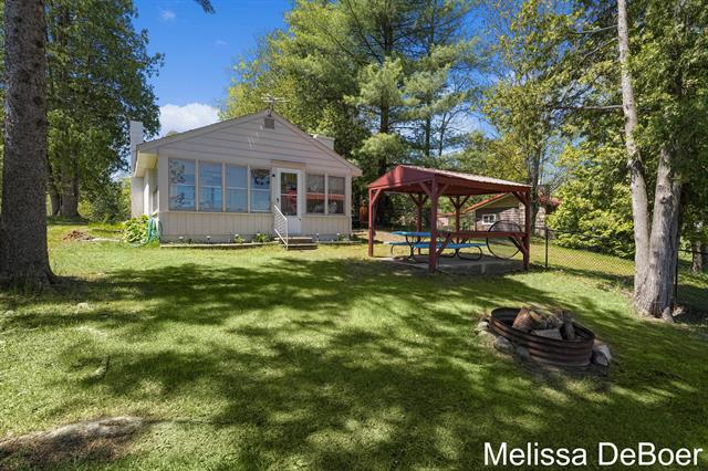 front view picture of 8791 S Old State Avenue, Farwell, MI. 48622