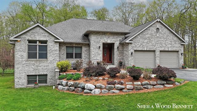 front view picture of 903 10 Mile Road Nw, Sparta, MI. 49345