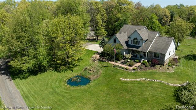 front view picture of 1355 Maxfield Road, Brighton, MI. 48114
