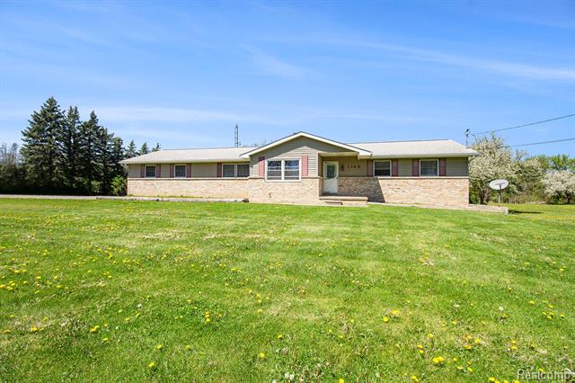 front view picture of 1148 W Cook Road, Grand Blanc, MI. 48439