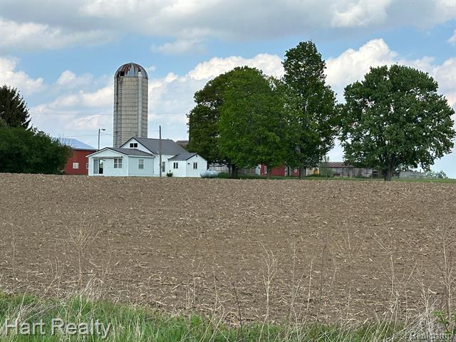 front view picture of 9548 Sharp Road, Clifford, MI. 48727
