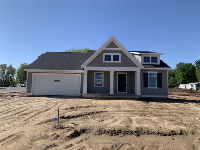 front view picture of 986 Ellerston Street Nw, Comstock Park, MI. 49321
