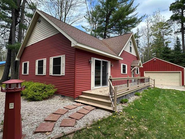 front view picture of 103 Red Bird Legion Drive, Roscommon, MI. 48653