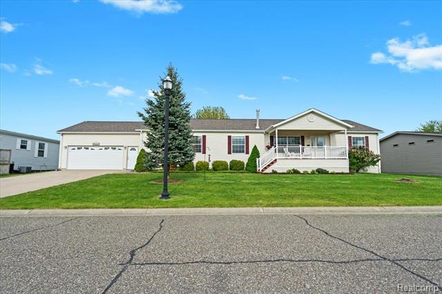 front view picture of 11209 Apple Grove, South Lyon, MI. 48178