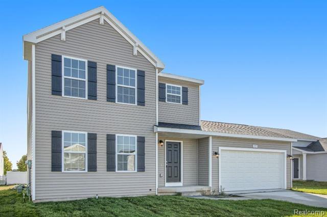 front view picture of 204 Kingsberry Drive, Blissfield, MI. 49228