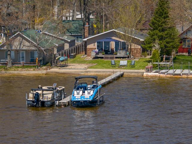 front view picture of 108 Eastbrook Avenue, Houghton Lake, MI. 48629