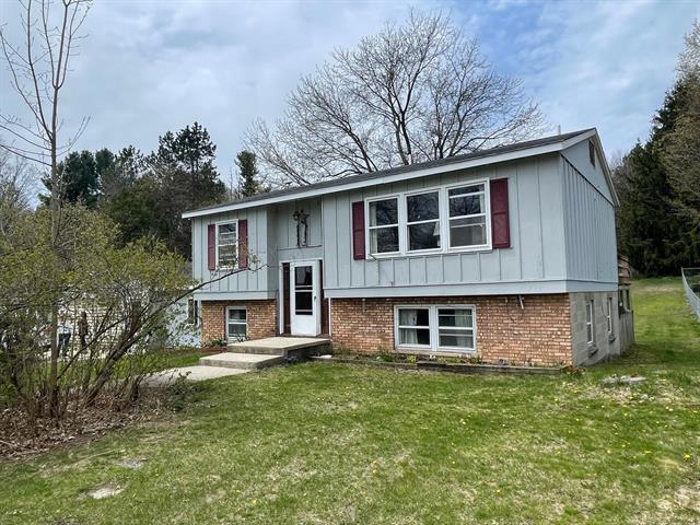 front view picture of 1993 West Street, Central Lake, MI. 49622