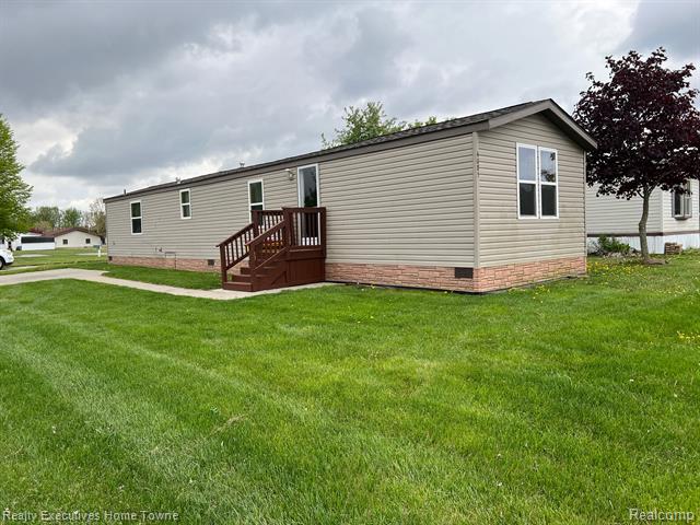 front view picture of 4085 Mapleview Court E, Brown City, MI. 48416