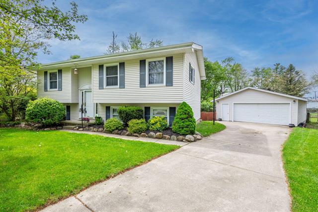front view picture of 201 Colebrook Drive, Clinton, MI. 49236