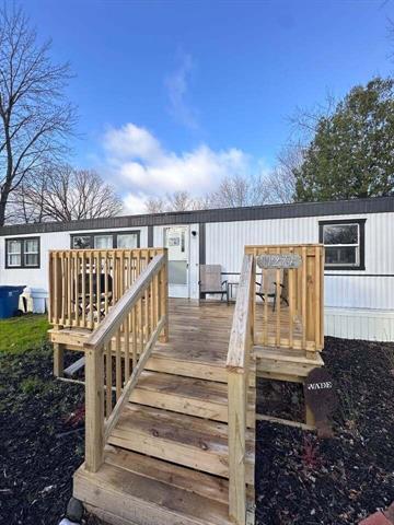 front view picture of 11274 Ann Street Se, Lowell, MI. 49331